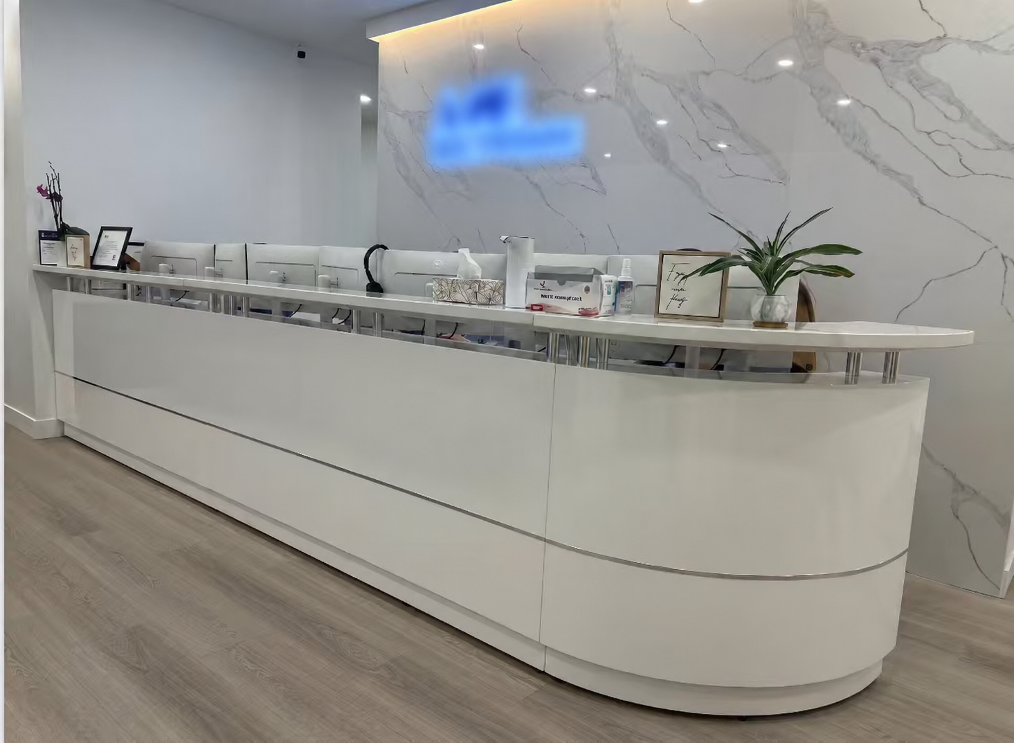Large curved reception counter installation