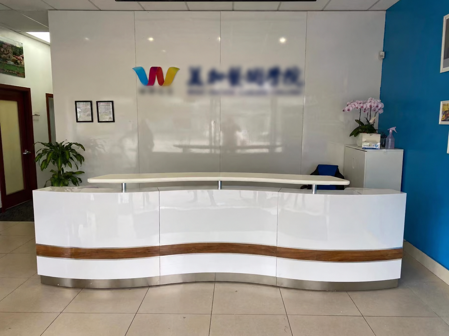 Curved custom reception desk installation